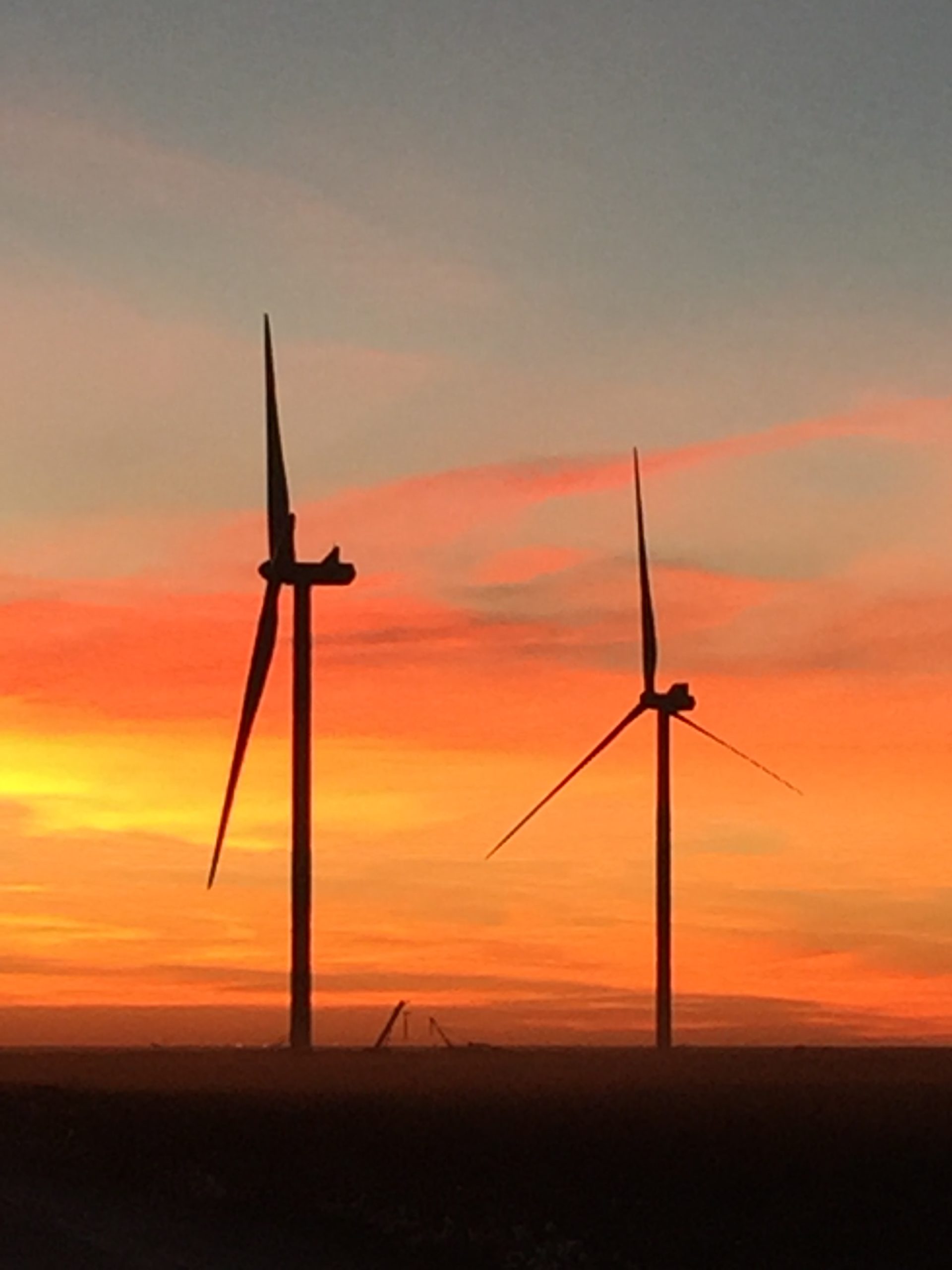 Sunset with two wind turbines